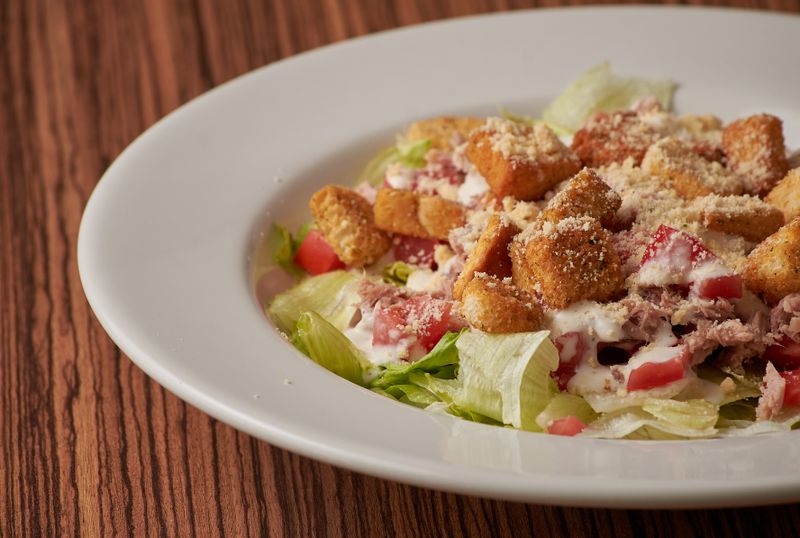 Classic Caesar Salad with romaine, croutons and parmesan